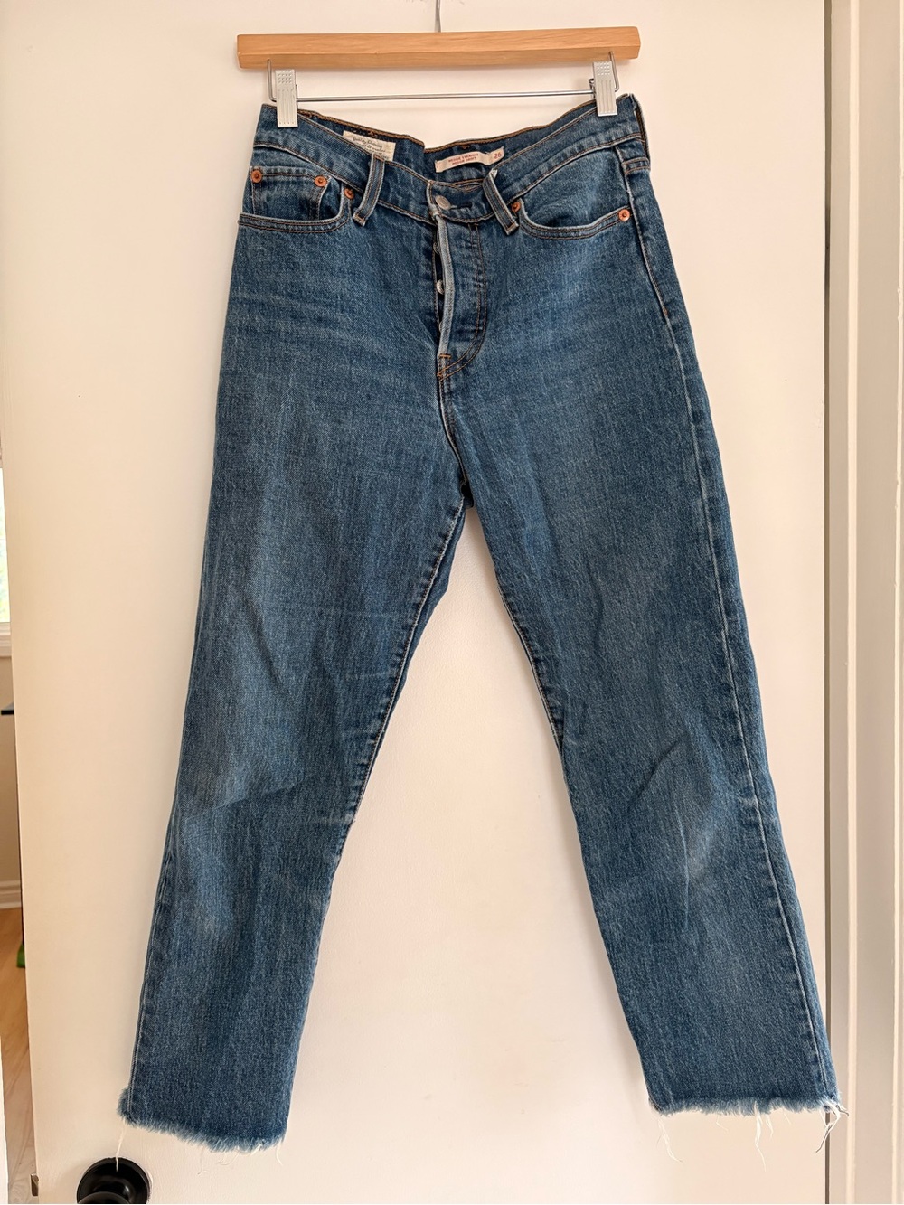 Levi’s Wedgie 501 Classic Straight Leg Blue Jeans with raw hem